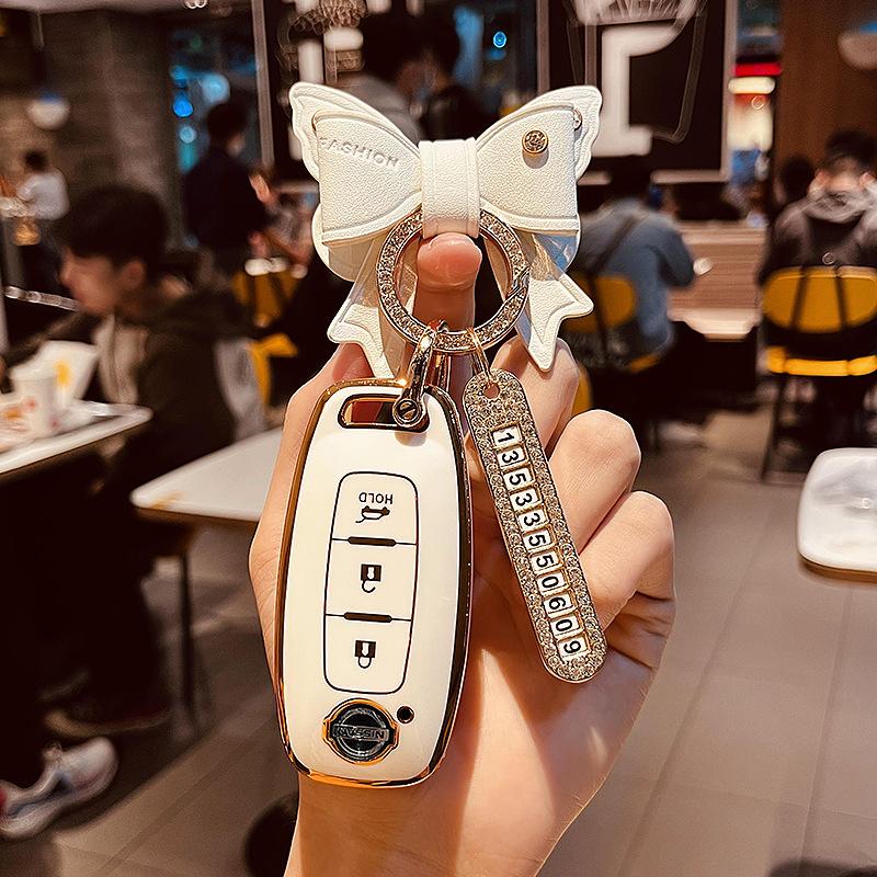 Применимо2023Новый чехол для ключей Nissan Teana Xuan Yi Сумка Nissan седьмого поколения Qashqai Qijun Shell22Сумка с пряжкой