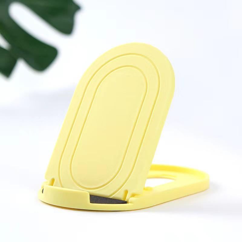 Foldable Phone & Tablet Stand: Portable, Adjustable & Universal