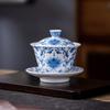 Suet jade porcelain blue and white ceramic kung fu tea set enamel color ten thousand flower cover bowl teacup household gift gift box