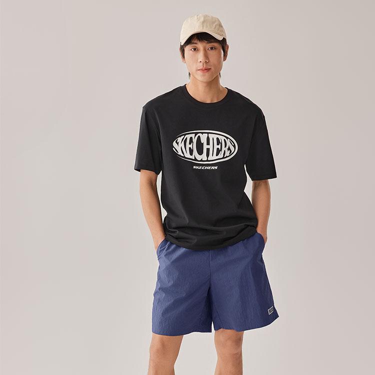 Skechers Модный вязаный пуловер с круглым вырезом, дышащая футболка с коротким рукавом и спущенной линией плеча, унисекс, цвет Угольно-черный L225U042-0018