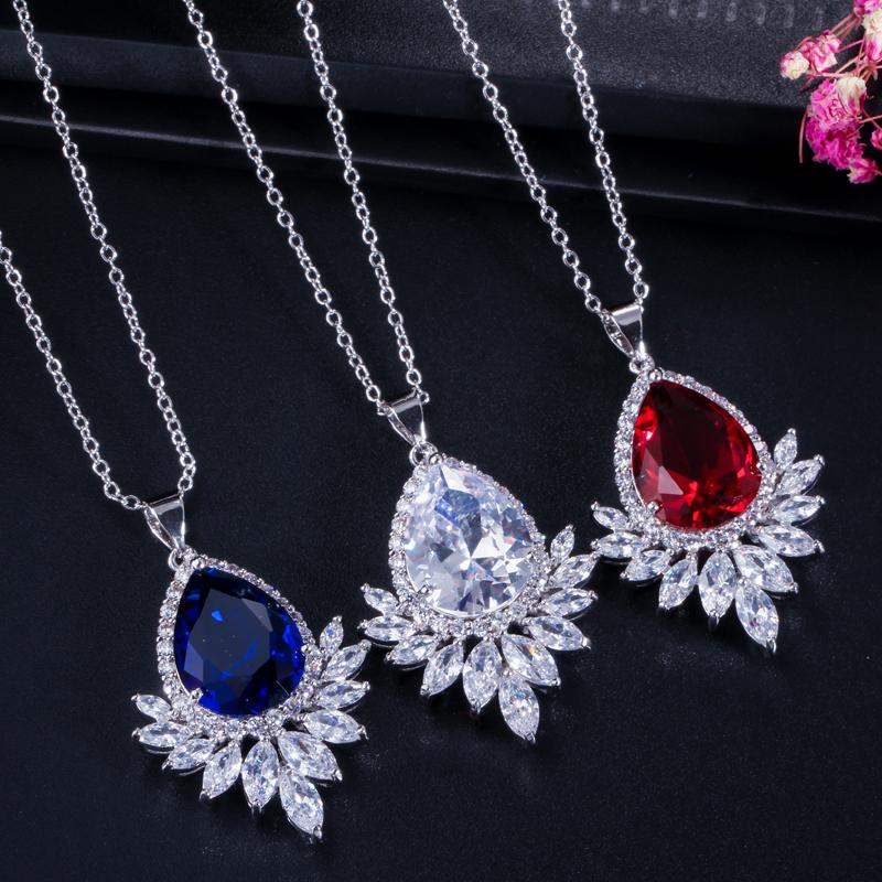 WWJ Dazzling Cubic Zirconia Marquise Cut Pendant Necklace and Drop Earrings Set