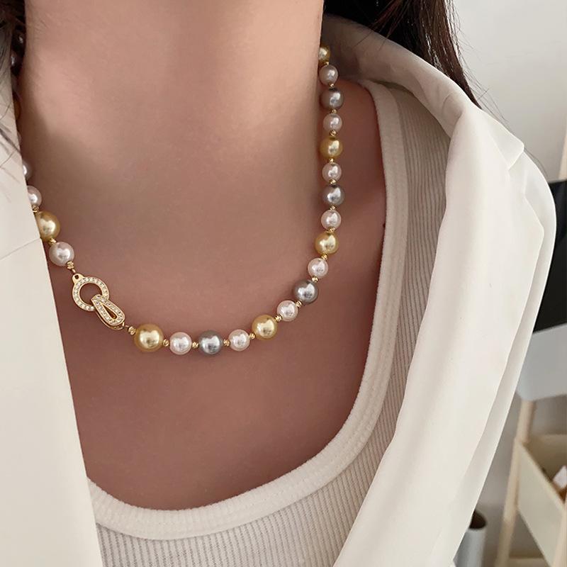 Жемчужное ожерелье Star Ni Ni имеет ту же самую цепочку на шею Shijia конфетного цвета, атмосферную легкую роскошь, высококачественную цепочку на ключицу для женщин
