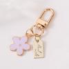 1Pcs Korean Hot-Selling Ins Metal Style Daisy Keychain Niche Usb Headphone Pendant Bag Protective Cover Pendant