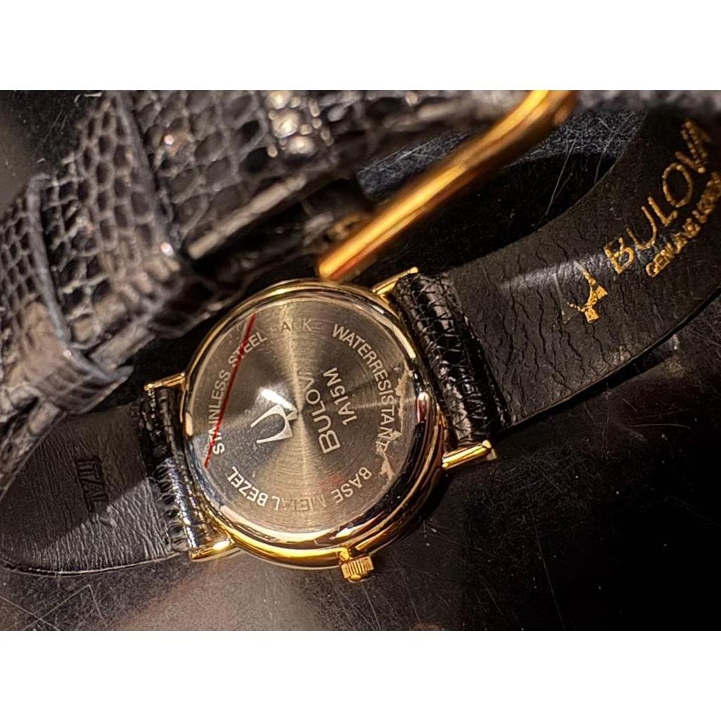 Использовал  (Редко) [Bulova] Кварцевые часы Bulova черные/золотые
