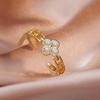 New High-level Sense of Fashion Light Luxury Zirconia Four-leaf Clover Ring Versatile Lucky Grass Open Finger Ring Female