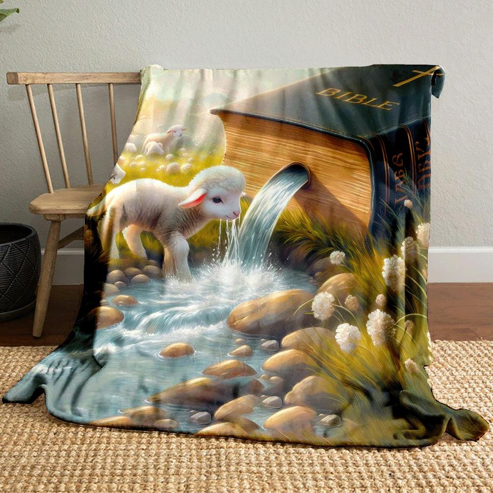 A Bible pours water into a stream with lambs grazing in a serene field. for all seasons blanket lunch break throw gift