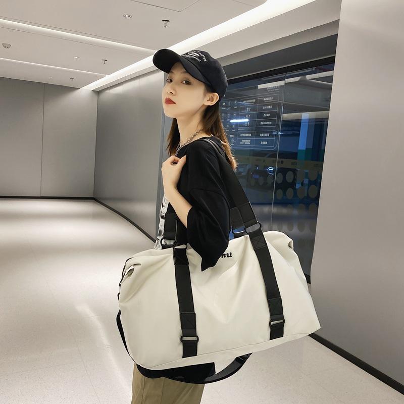 Travel bag Light business trip luggage Large capacity short trip messenger bag Leisure sports fitness bag Women