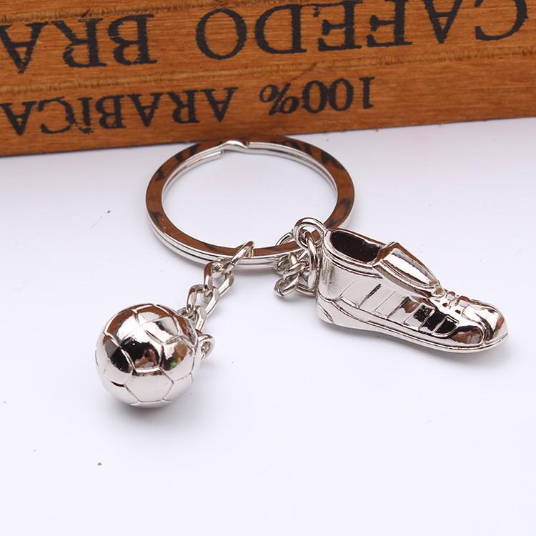 "Creative World Cup Soccer Shoe Keychain: Metal National Team Logo Gift for Company or Community Events"