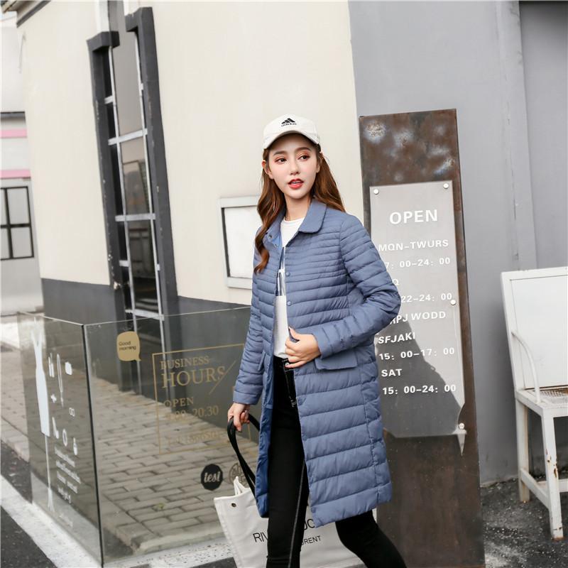 Осень и зима новая корейская версия облегающего кроя средней и длинной куртки-пуховика женская тонкая лацкан большого размера с длинным рукавом оптовая тенденция