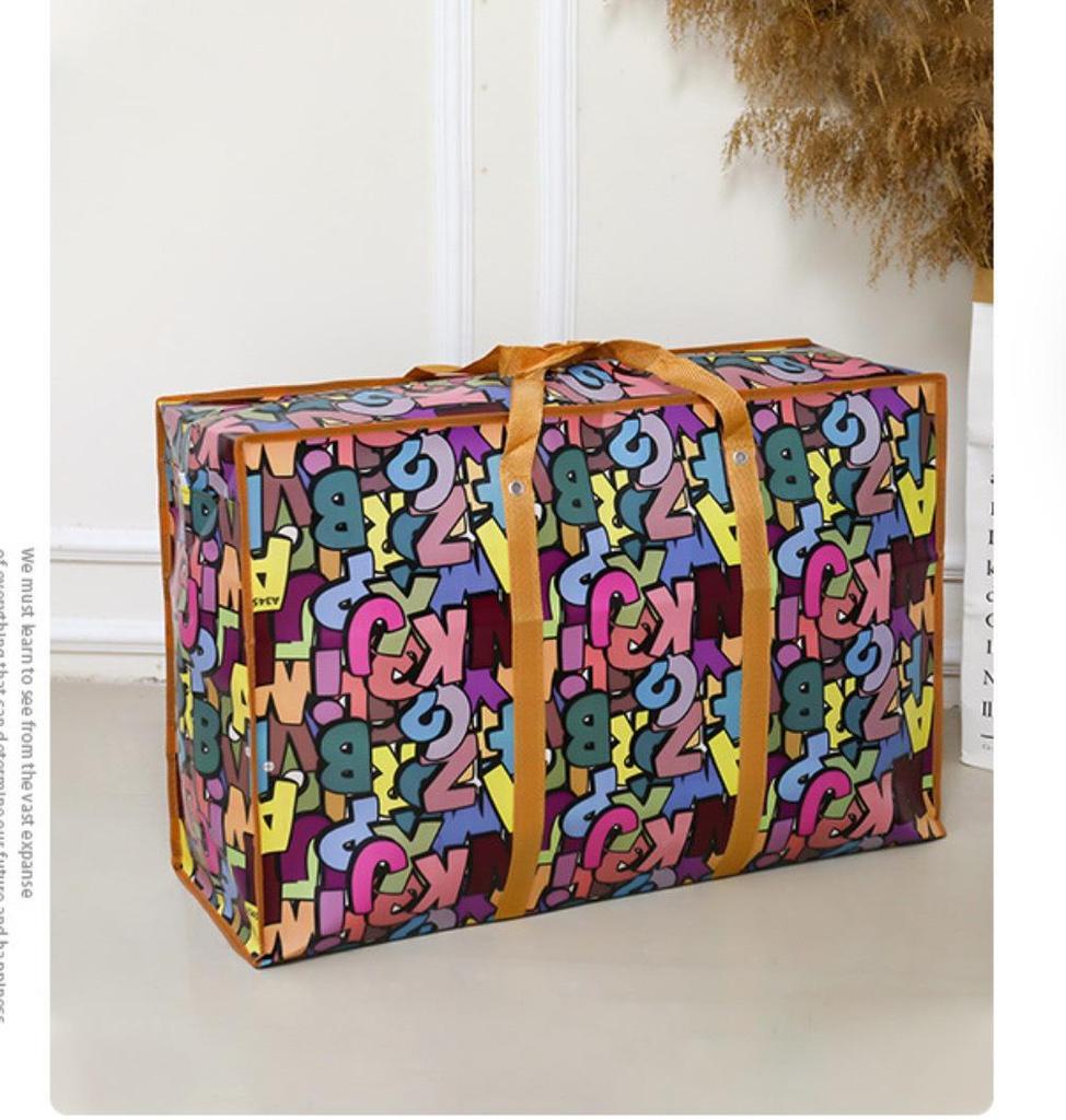 Вместительная нетканая дорожная сумка для влагозащищенного хранения одеял и одежды