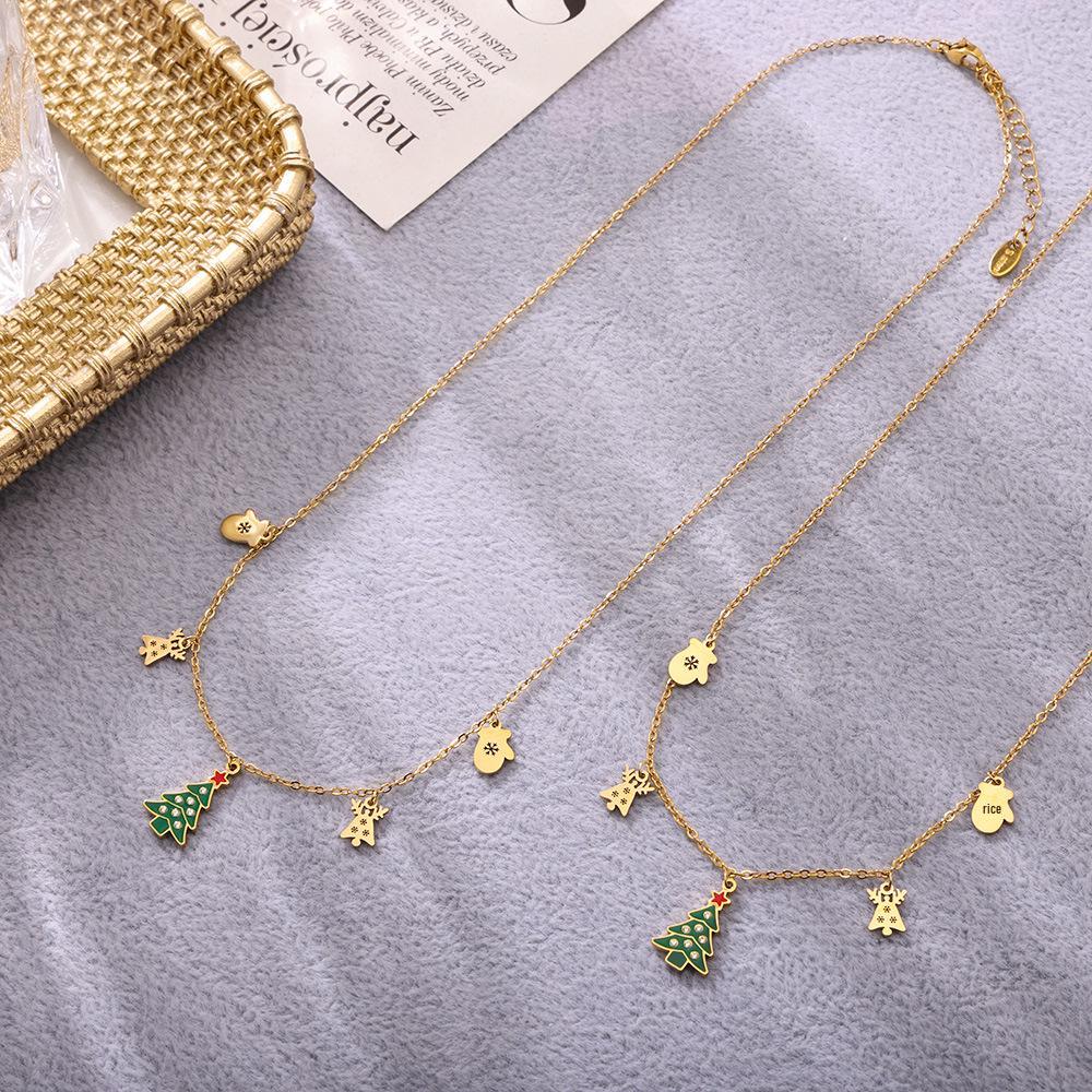 Подвеска-кулон в виде зеленого эмалированного колеса обозрения на рождественскую елку с цирконом, кисточкой в виде оленя и цепочкой из нержавеющей стали.