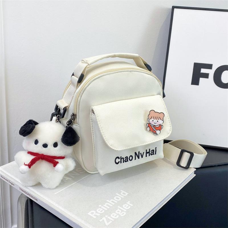 Cute Japanese canvas bag 2025 early autumn new small fresh messenger bag women's Korean version fashion simple messenger bag