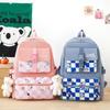 New Schoolbag, Primary School Student Burden Reduction Backpack, Light Plaid Four-piece Student Backpack