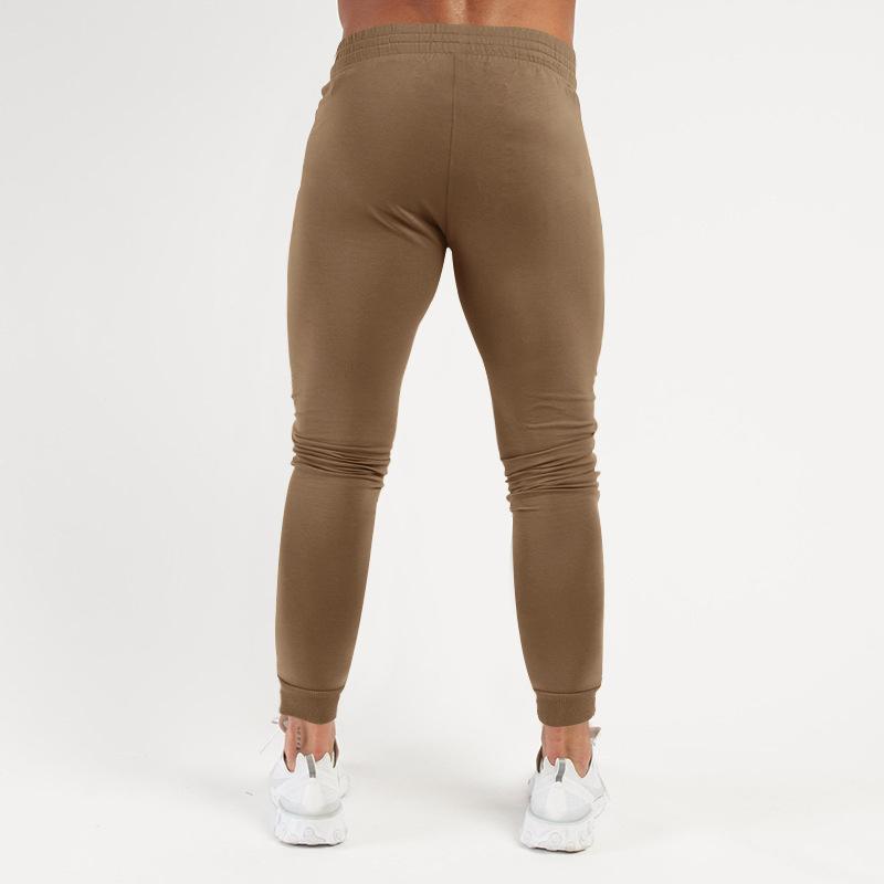 Весна и лето Новые однотонные спортивные брюки повседневные эластичные спортивные брюки мужская мода