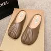 Ленивые люди крутят педали, а голова в пакете и полушлепанцы для женщин носить 2025 весна и лето новая обувь Мюли на плоской подошве из мягкой кожи крутые шлепанцы