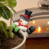 Santa Claus Ornament Resin Decorative Figurine Playful Leaning Pose Flower Pot Statue with Bright Red White Colors Christmas Decor