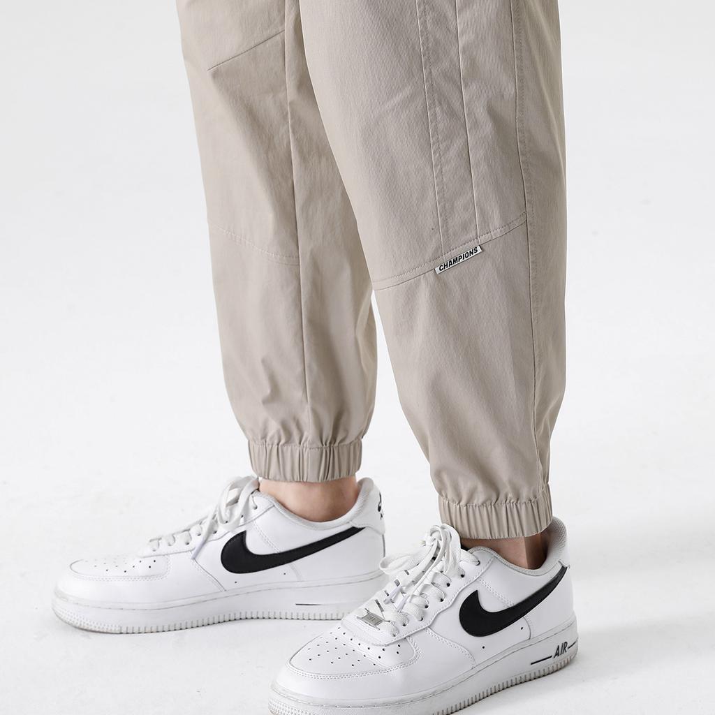 High twist wrinkle resistant cotton toe binding men's sports pants, loose tapered casual pants