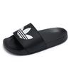 Adidas Тапочки Adidas Adilette Light Junior из универмага Тэгу