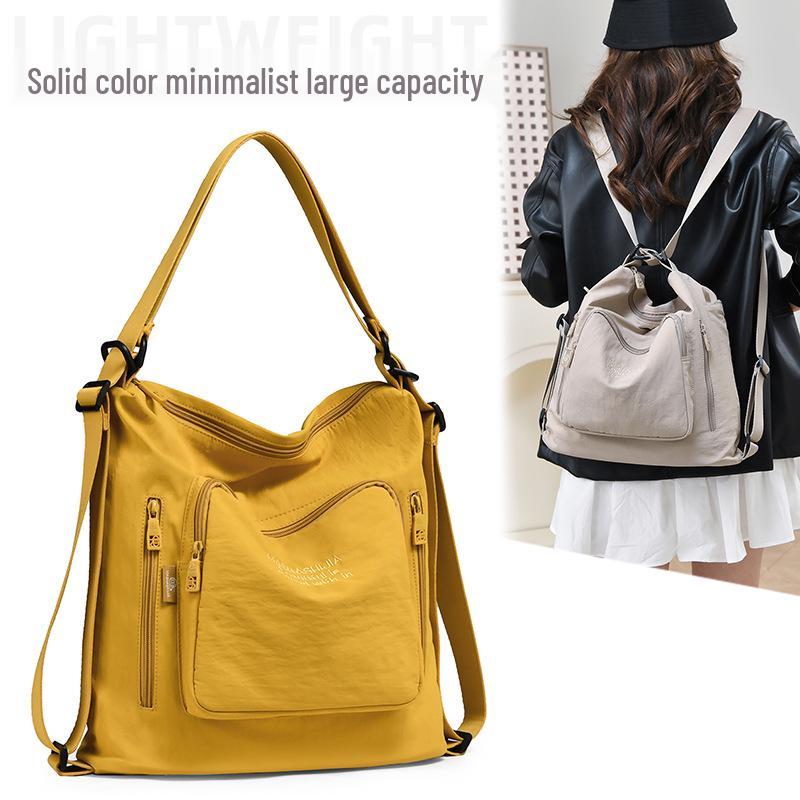2025 Мода Японии и Южной Кореи Женская большая вместительная сумка через плечо и повседневный студенческий рюкзак