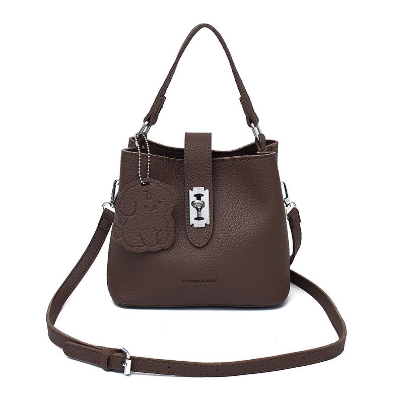 Премиальная текстура портативная сумка-ведро женская 2025 осень и зима новая сумка под мышку универсальная для поездок на работу с узором личи сумка-мессенджер