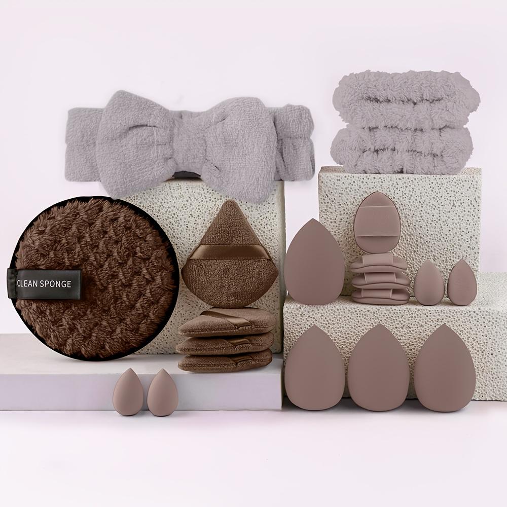 Набор из 20 кистей для макияжа, включающий мягкие и пушистые инструменты для нанесения тональной основы, пудры и растушевки теней для век. Включает спонжи для макияжа и повязку для мытья головы.