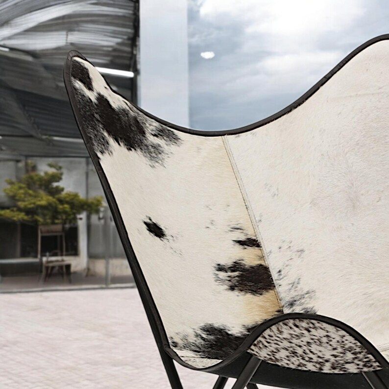 Handcrafted Hairon Leather Chair - Unique Rustic Cowhide Accent Chair for Living Room, Dining, or Office"