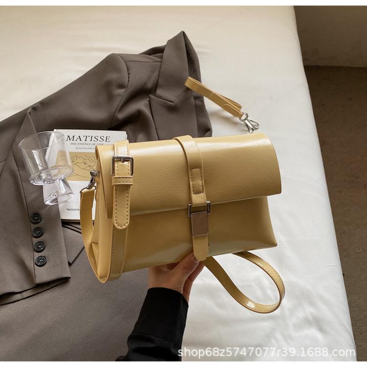 Retro casual commuter bag women's simple and versatile bucket bag 2025 spring niche fashion one-shoulder underarm bag