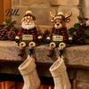 Winter Holiday Room Decor Christmas Stocking Holder, Mantel Resin Sitting Leg Hook, Mantle Hooks Festive Character Ornament for Home Fireplace Display