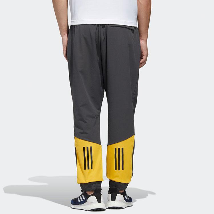 Adidas Брюки-зауженные из тканого материала Мужские штаны Серые GP6400