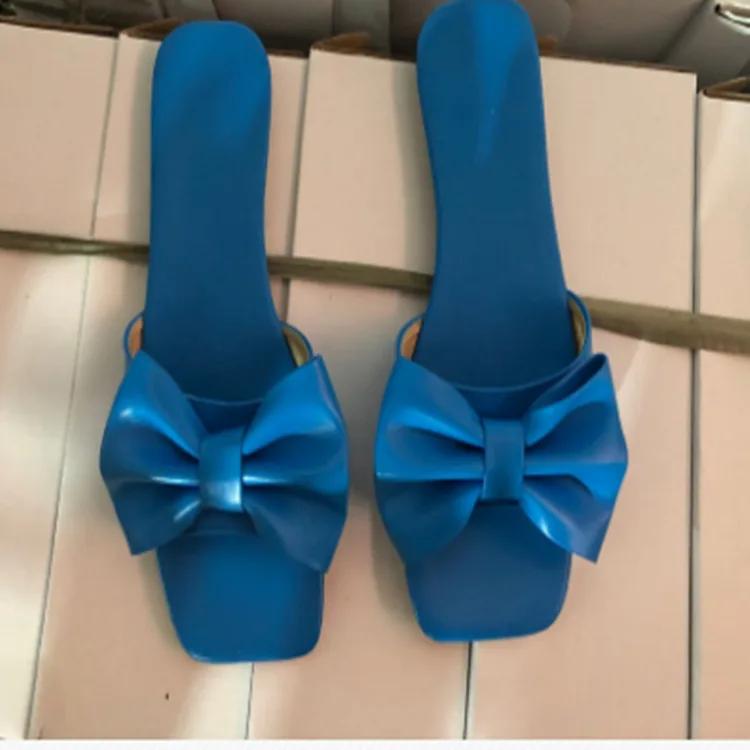 2024 Женские летние новые тапочки с бантом, модные плоские сандалии большого размера ярких цветов, женские сексуальные повседневные пляжные туфли для отдыха на открытом воздухе