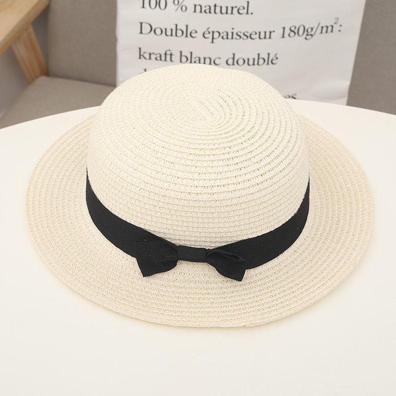 New wide-brimmed flat-top straw hat women's summer sun protection vacation bow top hat shading versatile beach hat women's tide