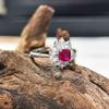 Gessen Jewelry: Элегантный набор: серьги, кольцо и подвеска с красными цирконами