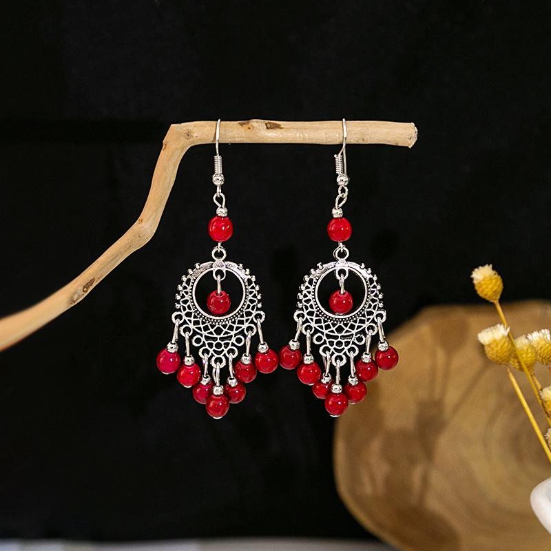 European and American Retro Hollow Turquoise Tassel Bohemian Earrings for Women