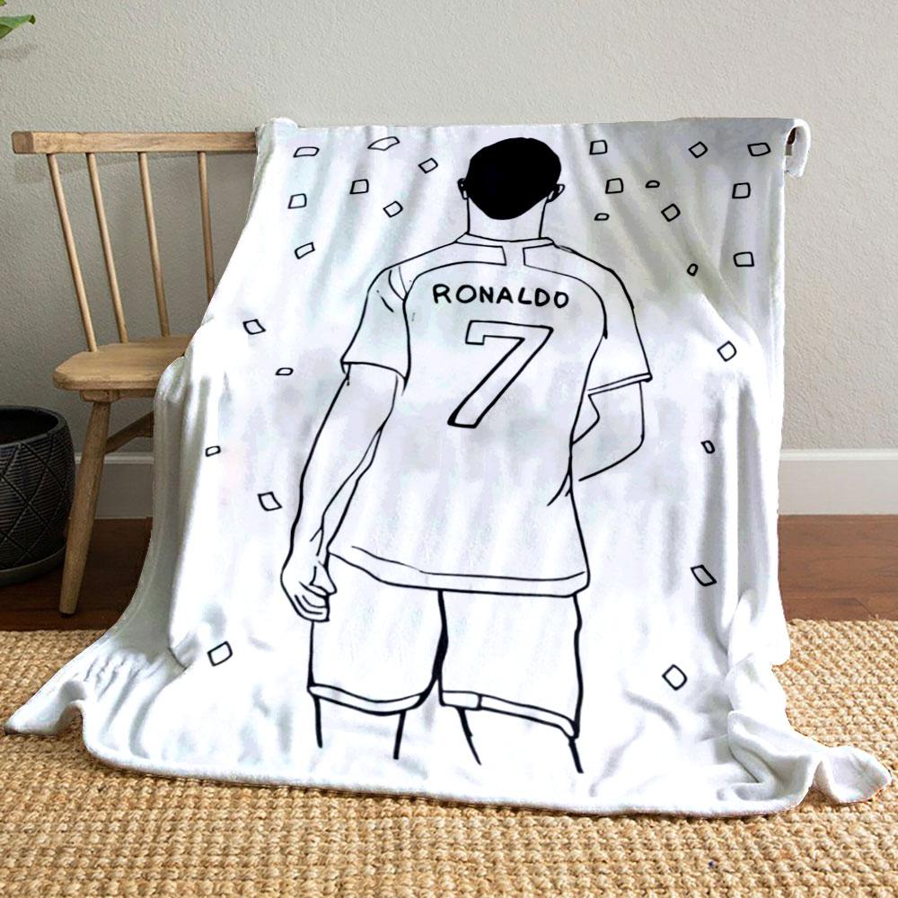 A person wearing a jersey labeled "RONALDO" with "7" surrounded by confetti. for all seasons blanket lunch break throw gift