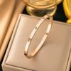 Stainless Steel Women's Bracelet with Diamonds and Four-Leaf Clover Studs - Non-fading, Cross-border Design.