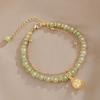 High-End Natural Hetian Jade Wind Chime Bracelet for Women - Lucky Bead Palace Bell Design