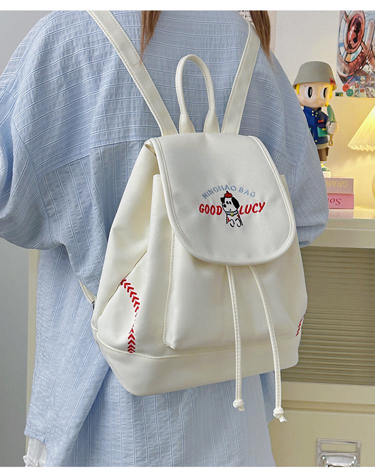 Japanese Student Casual Backpack with Embroidered Puppy Design, Drawstring Closure, and Matching Small Bag for Daily Use.