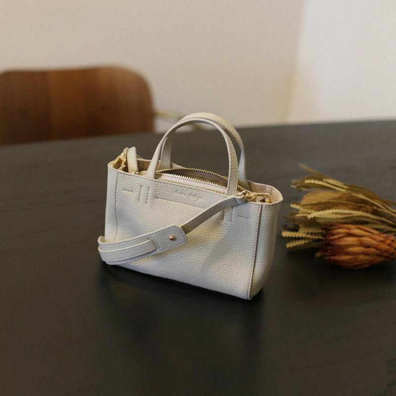 Новая весенне-летняя французская мини-сумка-тоут из коровьей кожи, модная женская сумка через плечо из натуральной кожи