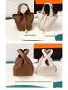 2025 Minimalist Veggie Basket Bag: Lychee Grain Cowhide, Fashionable & Spacious Handbag