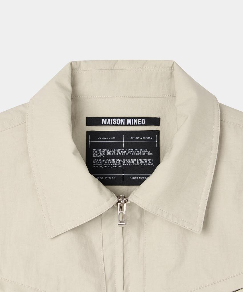 Бейжевая ветровка Maison Mined с накладным карманом