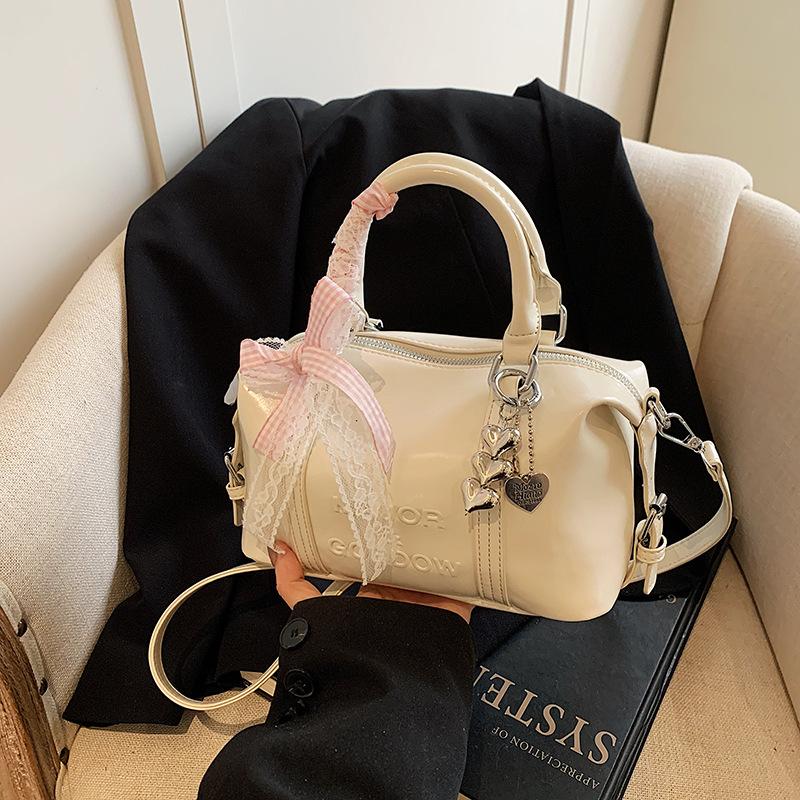 Модная нишевая сумка-боулинг для ручной носки женская 2025 новая трендовая корейская версия, высококачественная сумка на плечо, универсальная сумка-мессенджер