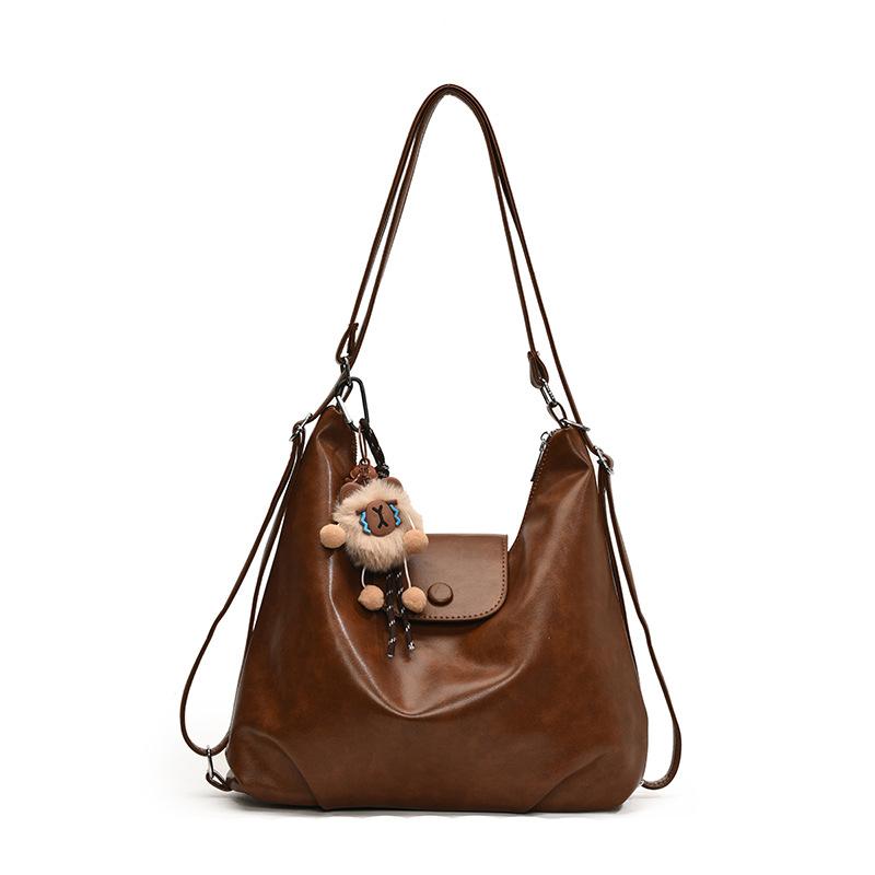 Сумка-тоут 2025 весна новая большая вместимость рюкзак для поездок на работу нишевый дизайн на плечо женская сумка многоцелевая сумка-мессенджер