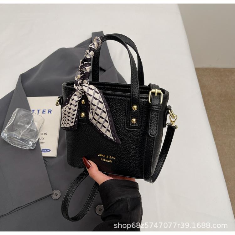 Fashion and High-quality Lychee Pattern Temperament Casual Portable Bucket Bag Women's Versatile Commuting Niche Solid Color PU Messenger Bag