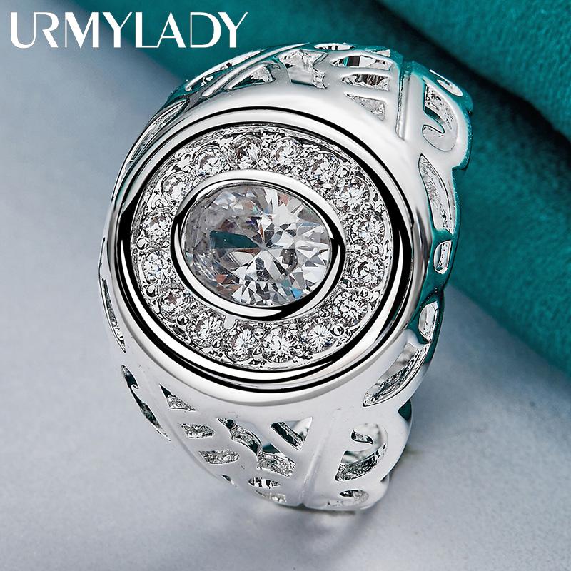 Серебряное кольцо в форме часов с фианитами