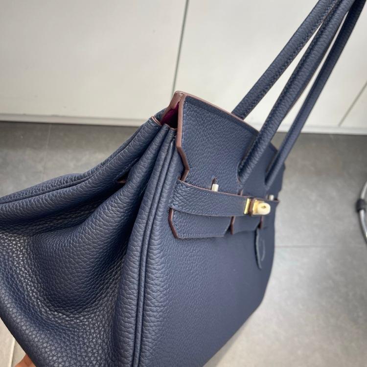 Cross-border trend bag short version oversized portable shoulder bag TOGO first layer cowhide large capacity giant pack