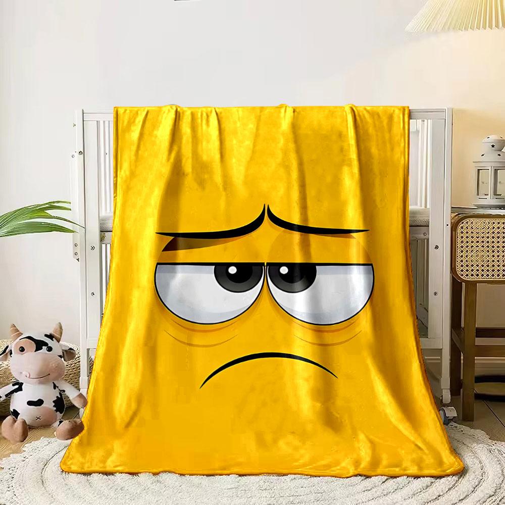 Yellow background with a sad cartoon face featuring droopy eyes and frown. for all seasons blanket lunch break throw gift
