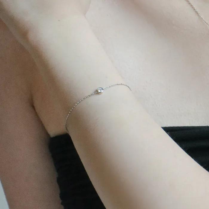 Серебряный браслет-цепочка с безелем и кубическим цирконием
