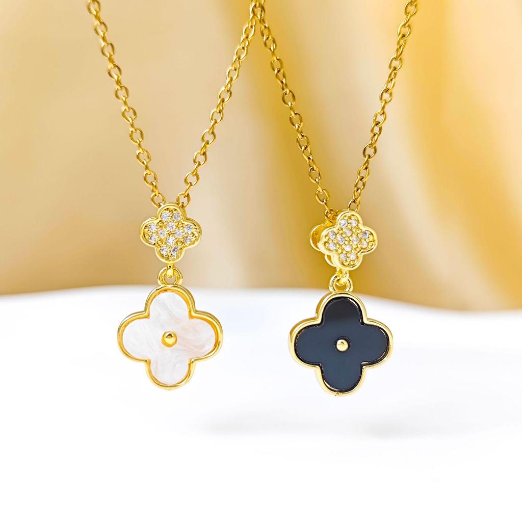 Stylish Korean Four-Leaf Clover Pendant with Micro-Inlaid Zircon and Tassel on a Titanium Steel Clavicle Chain