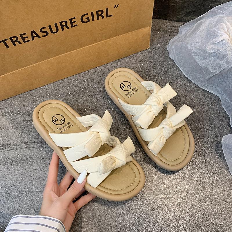 Sandals women's summer thick-bottomed versatile skirt 2025 wear new slippers one-word bow