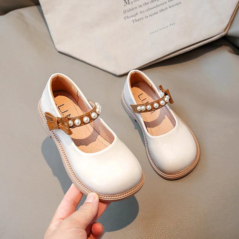 Весенние туфли принцессы из кожи для девочек, глянцевые детские туфли на плоской подошве из искусственной кожи, модные детские школьные туфли Мэри Джейн, повседневные, с жемчужным бантом, универсальные